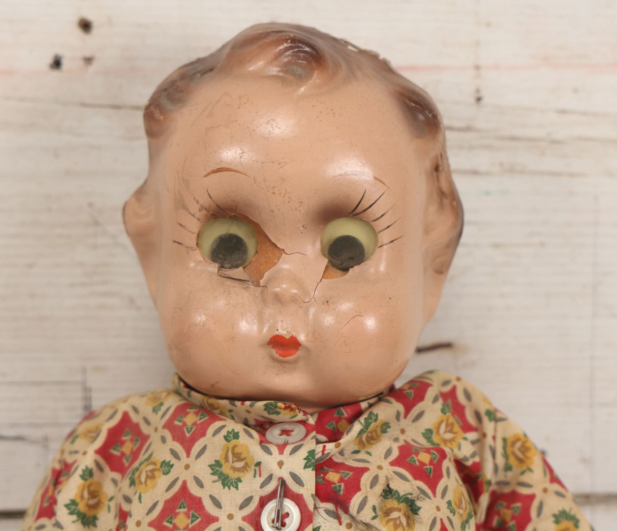 Lot 086 - Vintage Composition Head Googly Eye Baby Doll With Wooden Feet And Cloth Body, Wearing Patterned Shirt And Green Pants, 15-1/2" H