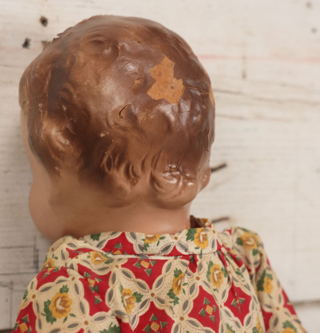 Lot 086 - Vintage Composition Head Googly Eye Baby Doll With Wooden Feet And Cloth Body, Wearing Patterned Shirt And Green Pants, 15-1/2" H
