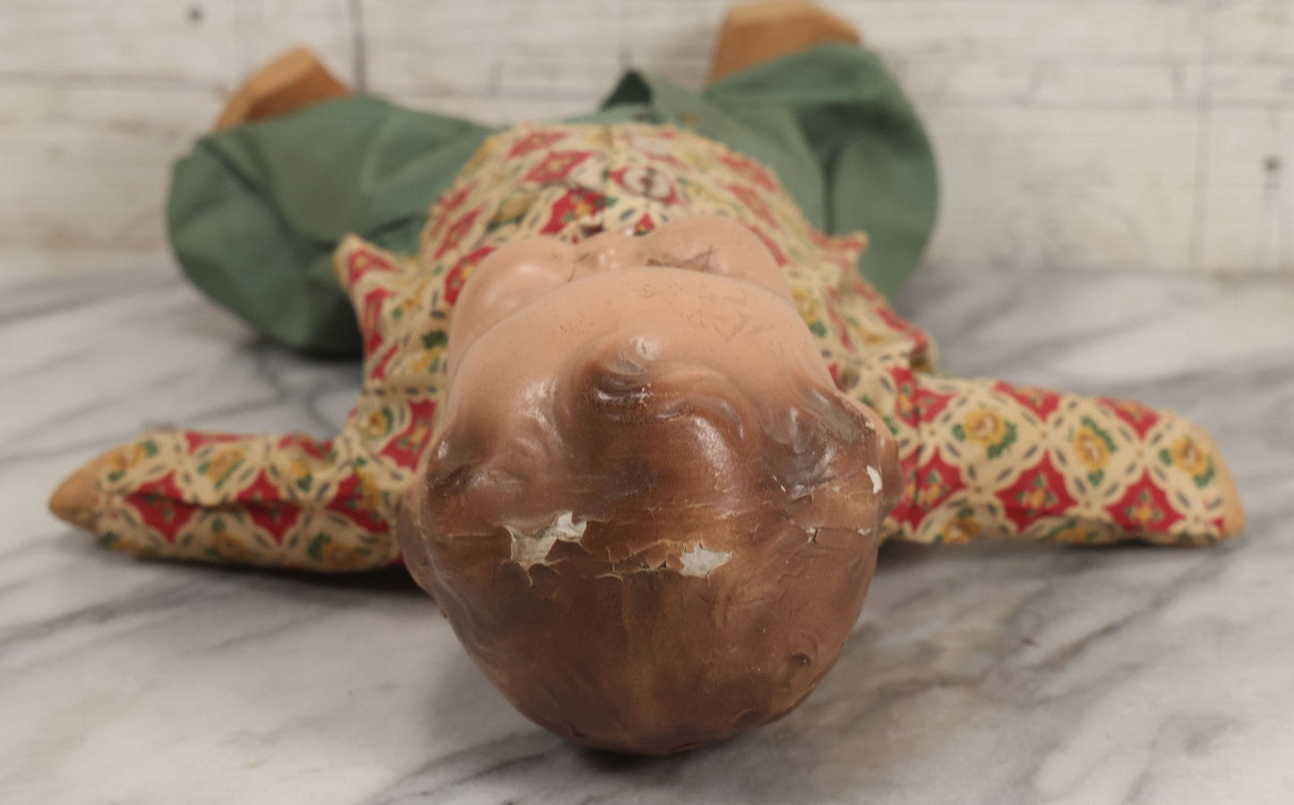 Lot 086 - Vintage Composition Head Googly Eye Baby Doll With Wooden Feet And Cloth Body, Wearing Patterned Shirt And Green Pants, 15-1/2" H