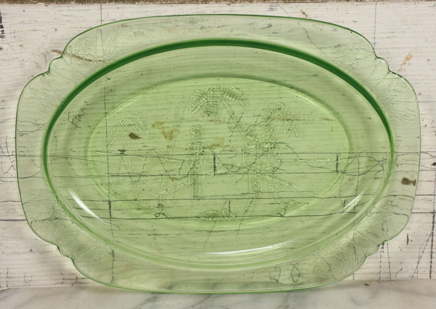 Lot 089 - Vintage Green Uranium Vaseline Glass Oval Dish By Federal Glass, Tropical Parrot And Palm Tree Motifs, Raised Underside Designs, Circa 1931, 11-1/2" x 8-1/4"