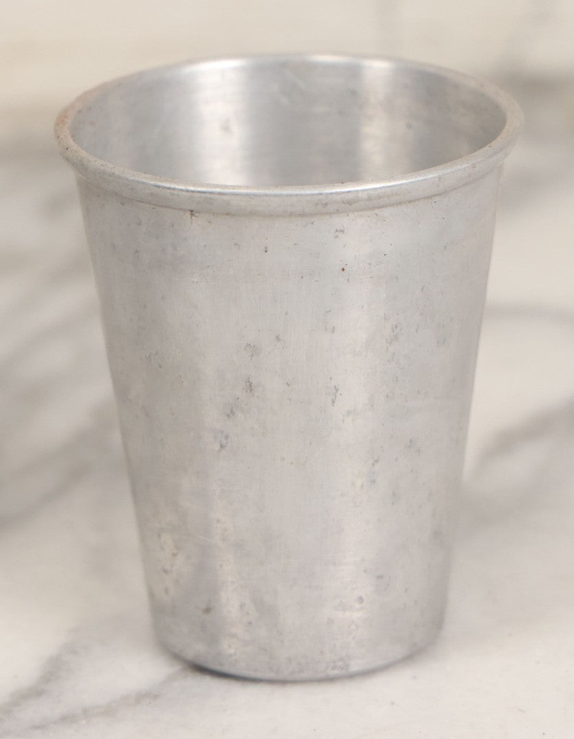 Lot 104 - Vintage Set Of Four Tin Travel Cups With Brown Leather Case