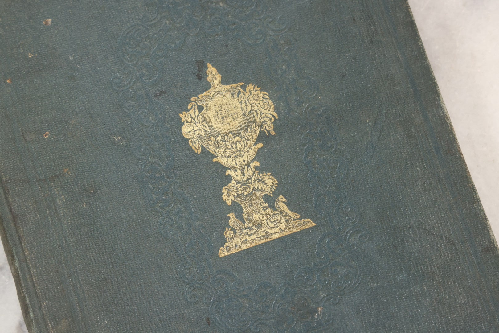 Lot 140 - Antique Handwritten Record Book For School District No. 13, Richmond, New Hampshire, 1854–1879, Blue / Green Cloth Cover With Gilded Urn Design