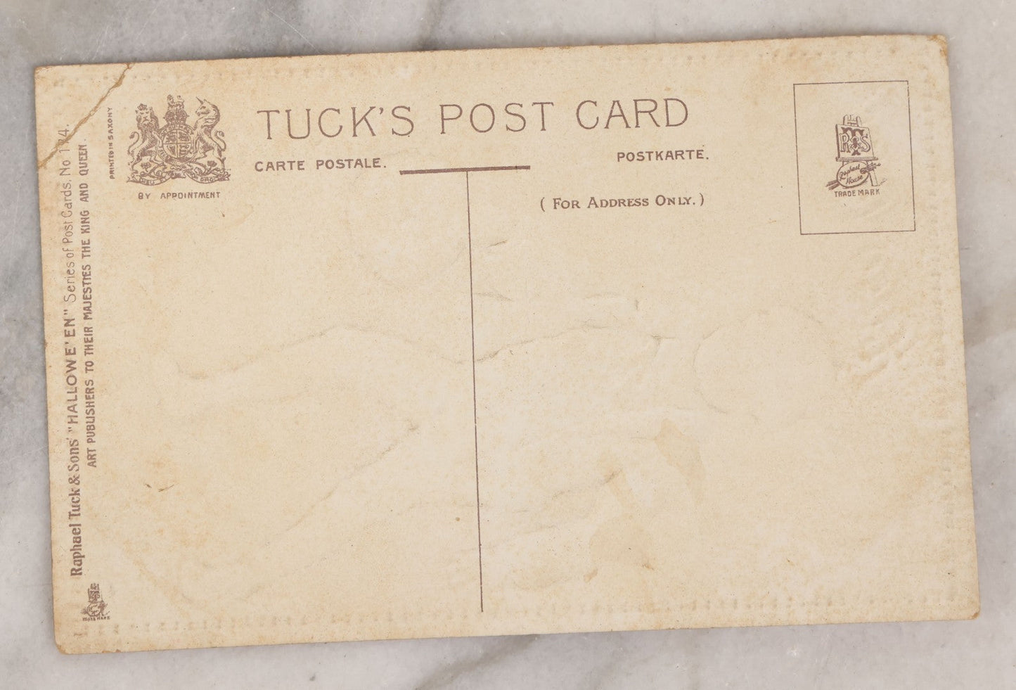 Lot 154 - Antique Embossed Halloween Postcard Of Boy With Jack-O-Lantern Candy Bucket, Copyright Raphael Tuck & Sons Co. Ltd., Halloween Series No. 174, Printed In Saxony, Unused, Circa 1910