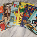 Lot 163 - Grouping Of Six Vintage Gold Key Comics, Including Daffy Duck, Heckle And Jeckle, Top Cat, Road Runner, The Three Stooges, And Bonanza