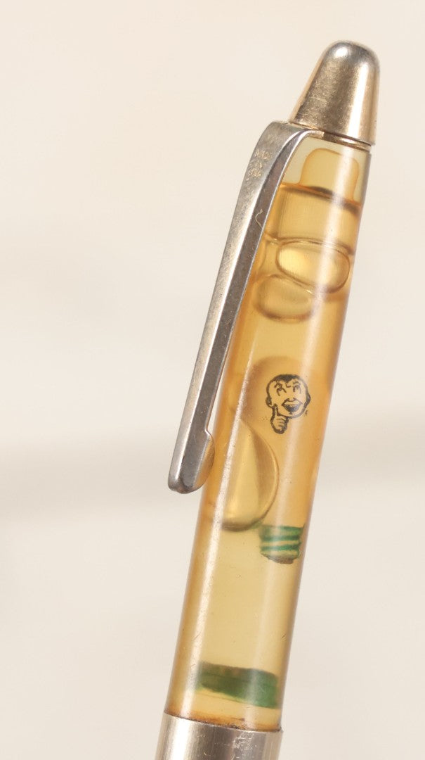 Lot 190 - Vintage Novelty Mechanical Pencil With Floating Lightbulb And "Ivan Idea" Character, 5-3/8" L