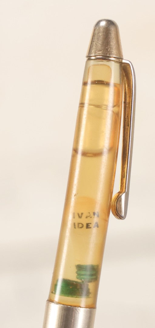 Lot 190 - Vintage Novelty Mechanical Pencil With Floating Lightbulb And "Ivan Idea" Character, 5-3/8" L