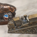 Lot 191 - Pair Of Vintage Pot Metal Souvenir Figurines, Cog Railway White Mountains, New Hampshire And Bison From Mt. Rushmore, South Dakota