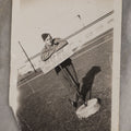 Lot 195 - Vintage Snapshot Photograph Of Soldier Smoking Pipe Leaning On (And Disobeying) "Keep Off / Use Walkway" Sign