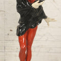Lot 012 - Vintage Porcelain Mephisto (Mephistopheles) Figurine, By Karl Tutter For Hutschenreuther, Germany, Kunstabteilung, U.S. Zone Mark, Note Feather-On-Hat And Hood Repaired With Visible Glue, Circa 1955, 11-1/2" H