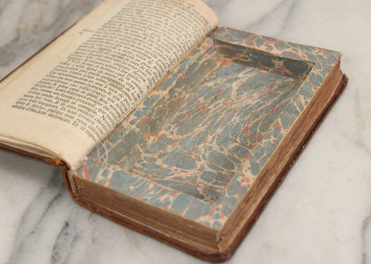 Lot 043 - Antique Hollowed Book Safe Made From “Traittez Sur La Prière Publique” (“Treatise On Public Prayer”), Bruxelles, 1707, By Eugene Henry Fricx, With French “P-V” Maker's Stamp
