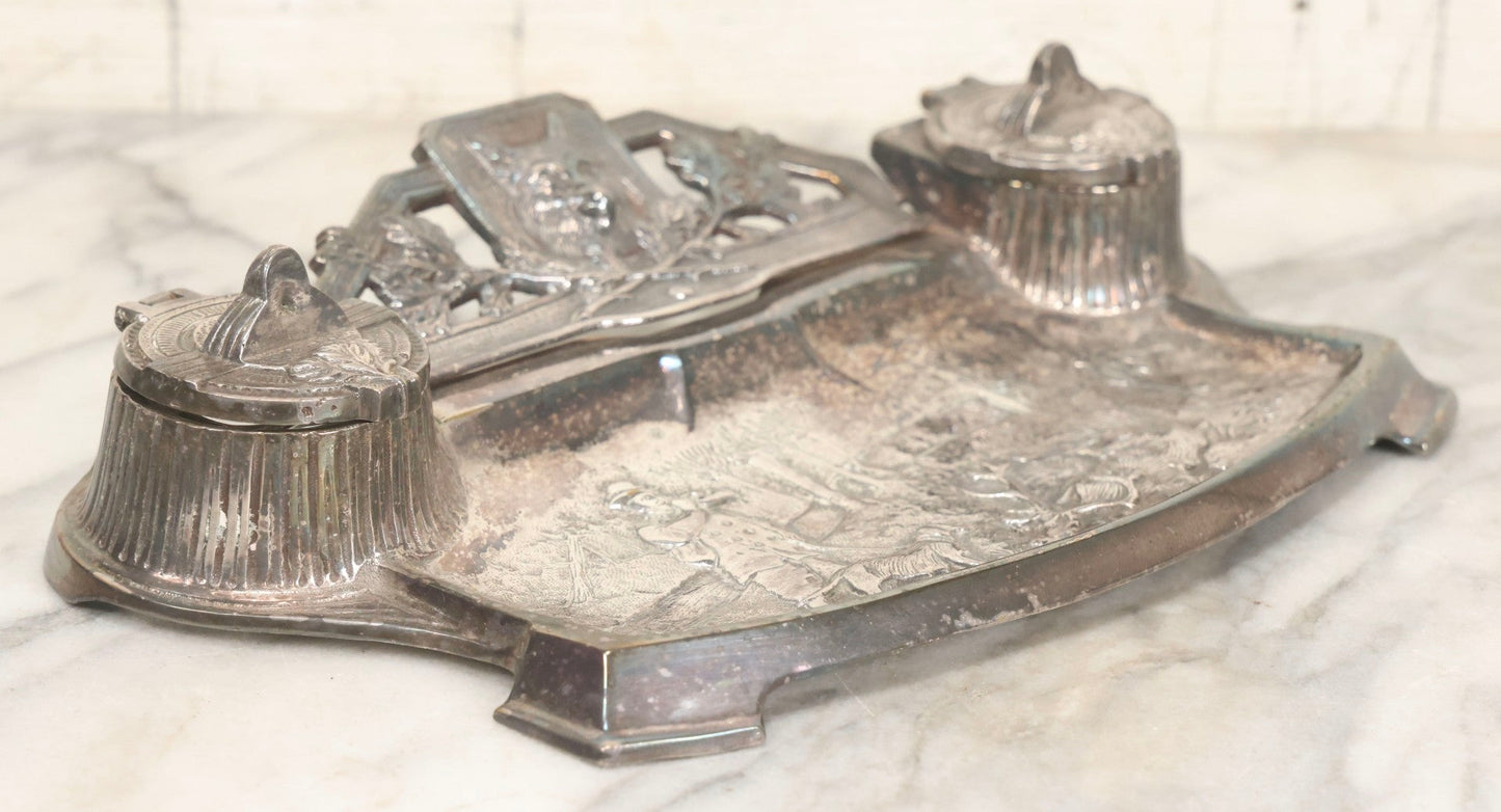 Lot 052 - Antique Cast Iron Double Inkwell With Chrome Finish Depicting Fox Head, Oak Branches, And English Hunting Scene With Hunter, Dog, And Stag, Stamped L.P., Circa Early 20th Century