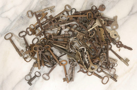 Lot 071 - Grouping Of 75+ Antique And Vintage Keys Including Over 50 Cast Iron And Brass Skeleton Keys By Penn, Crawford, Norwalk, Branford, And Others, Plus 25+ Assorted Vintage Flat Keys