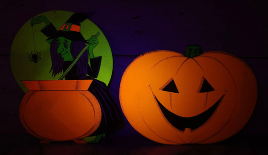 Lot 088 - Pair Of Vintage Blacklight-Reactive Hallowe'en Die-Cut Decorations Featuring Witch With Cauldron And Smiling Jack-O-Lantern, Unmarked, Circa 1970s–1980s
