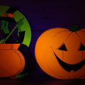 Lot 088 - Pair Of Vintage Blacklight-Reactive Halloween Die-Cut Decorations Featuring Witch With Cauldron And Smiling Jack-O-Lantern, Unmarked, Circa 1970s–1980s