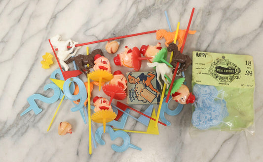 Lot 091 - Grouping Of Assorted Vintage Plastic Cake Toppers, Party Favors, And Birthday Candles, Including Horses, Clown Heads, Baby Heads, And Boy-Blue Numbers And Candles
