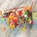 Lot 091 - Grouping Of Assorted Vintage Plastic Cake Toppers, Party Favors, And Birthday Candles, Including Horses, Clown Heads, Baby Heads, And Boy-Blue Numbers And Candles