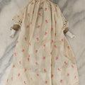 Lot 093 - Antique Doll With Porcelain Head, Hands And Feet And Cloth Body, With White Nightgown With Red Flower Print And Lace Borders, 12-1/4" H