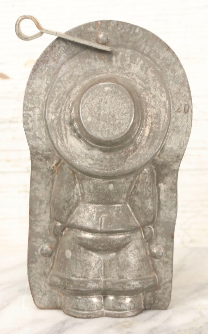 Lot 094 - Antique Anton Reich Dresden Tin Chocolate Mold Of Little Boy In Jacket, Square Pants, And Large Sun Hat, Missing Two Of Three Clips