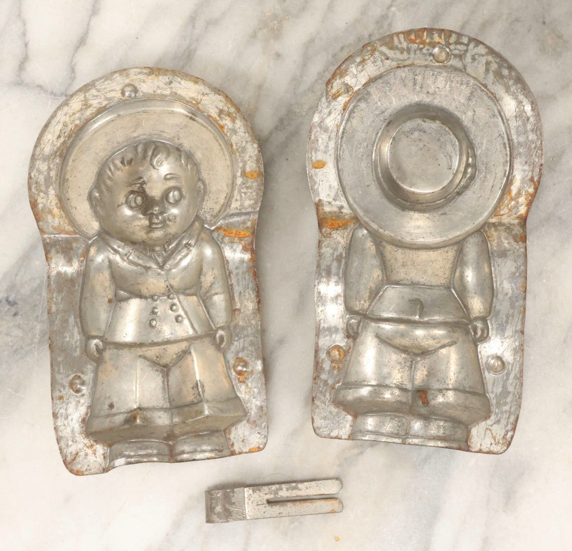 Lot 094 - Antique Anton Reich Dresden Tin Chocolate Mold Of Little Boy In Jacket, Square Pants, And Large Sun Hat, Missing Two Of Three Clips