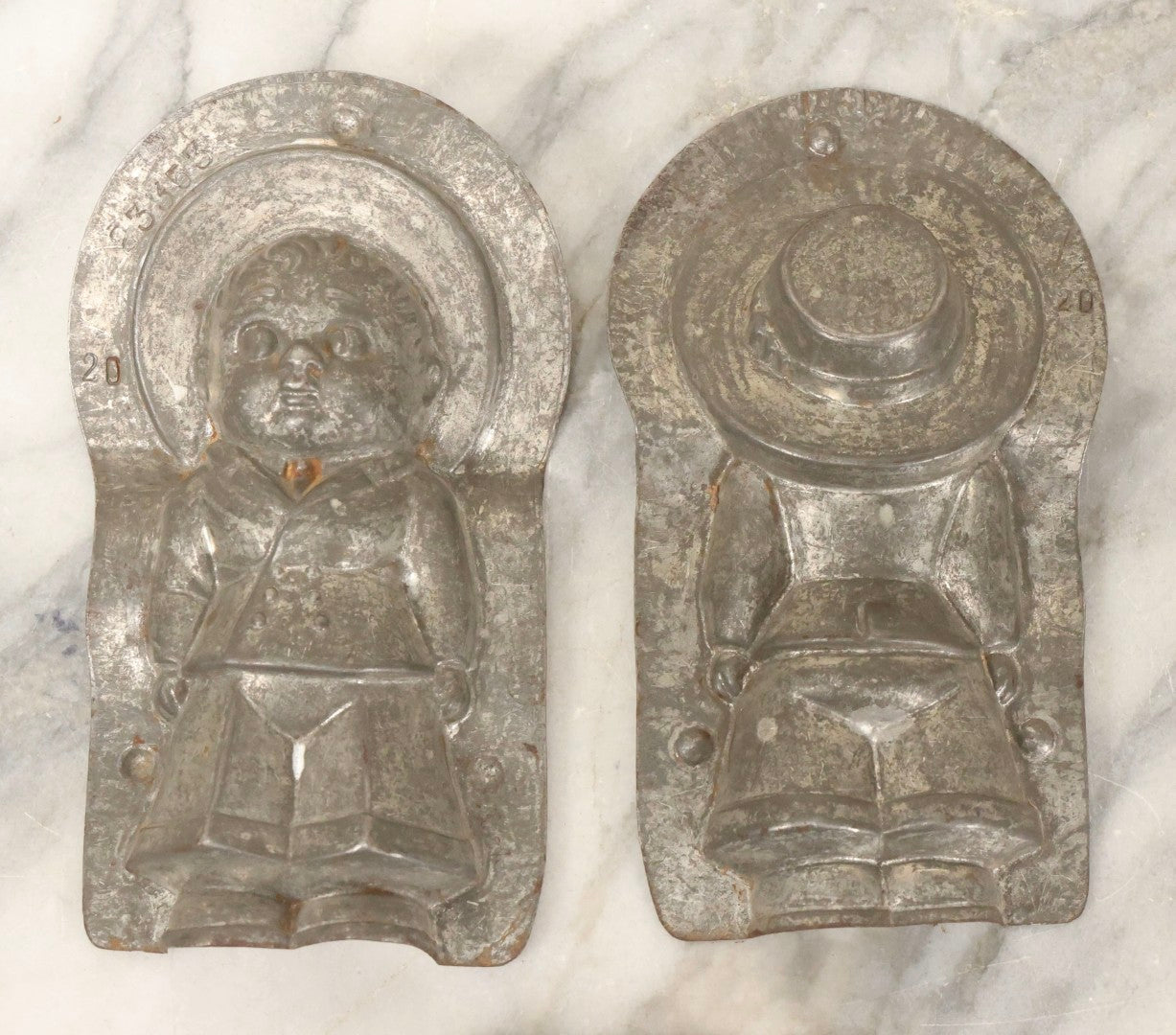 Lot 094 - Antique Anton Reich Dresden Tin Chocolate Mold Of Little Boy In Jacket, Square Pants, And Large Sun Hat, Missing Two Of Three Clips