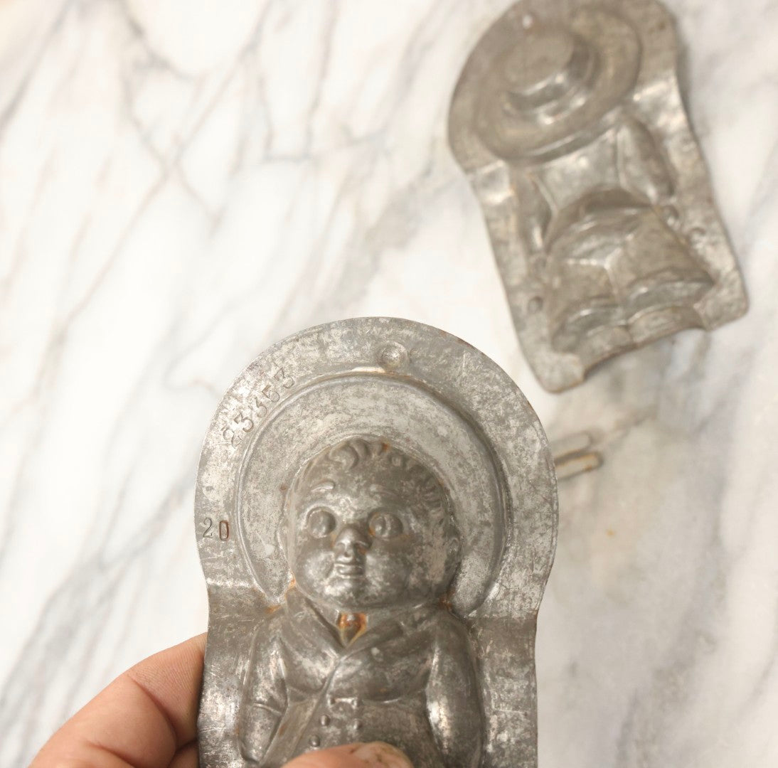 Lot 094 - Antique Anton Reich Dresden Tin Chocolate Mold Of Little Boy In Jacket, Square Pants, And Large Sun Hat, Missing Two Of Three Clips