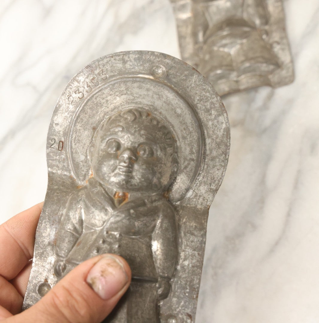 Lot 094 - Antique Anton Reich Dresden Tin Chocolate Mold Of Little Boy In Jacket, Square Pants, And Large Sun Hat, Missing Two Of Three Clips