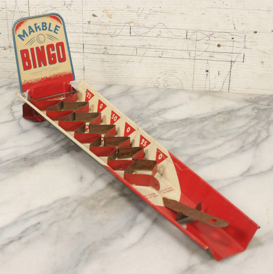 Lot 097 - Vintage Tin Lithograph "Marble Bingo" Toy With Folding Backboard And Spring Launcher, Made By Wolverine Supply Manufacturing Co., Pittsburgh, Pennsylvania, 16-1/2" L
