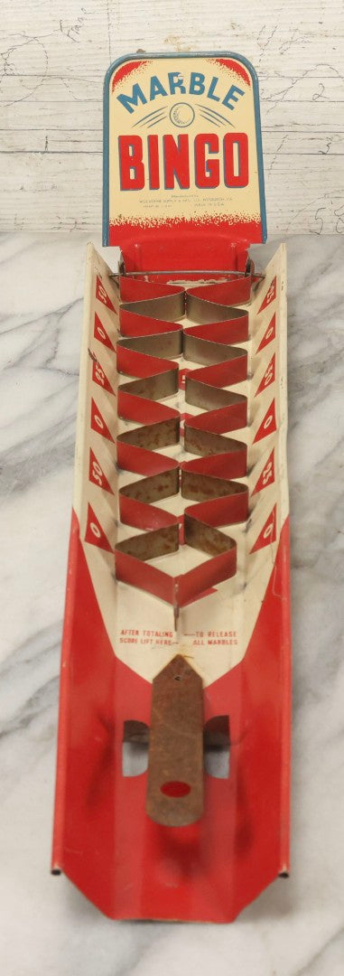 Lot 097 - Vintage Tin Lithograph "Marble Bingo" Toy With Folding Backboard And Spring Launcher, Made By Wolverine Supply Manufacturing Co., Pittsburgh, Pennsylvania, 16-1/2" L