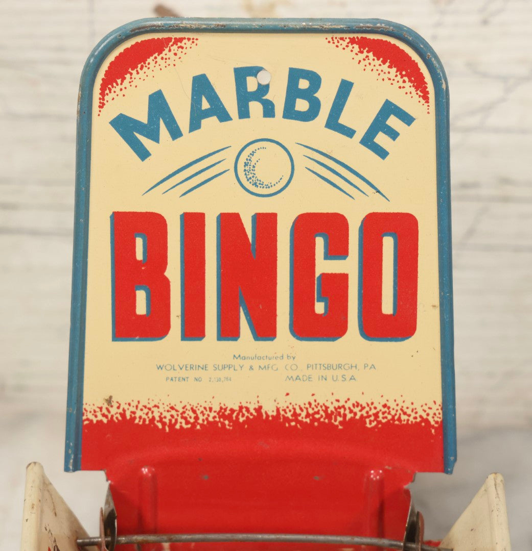 Lot 097 - Vintage Tin Lithograph "Marble Bingo" Toy With Folding Backboard And Spring Launcher, Made By Wolverine Supply Manufacturing Co., Pittsburgh, Pennsylvania, 16-1/2" L