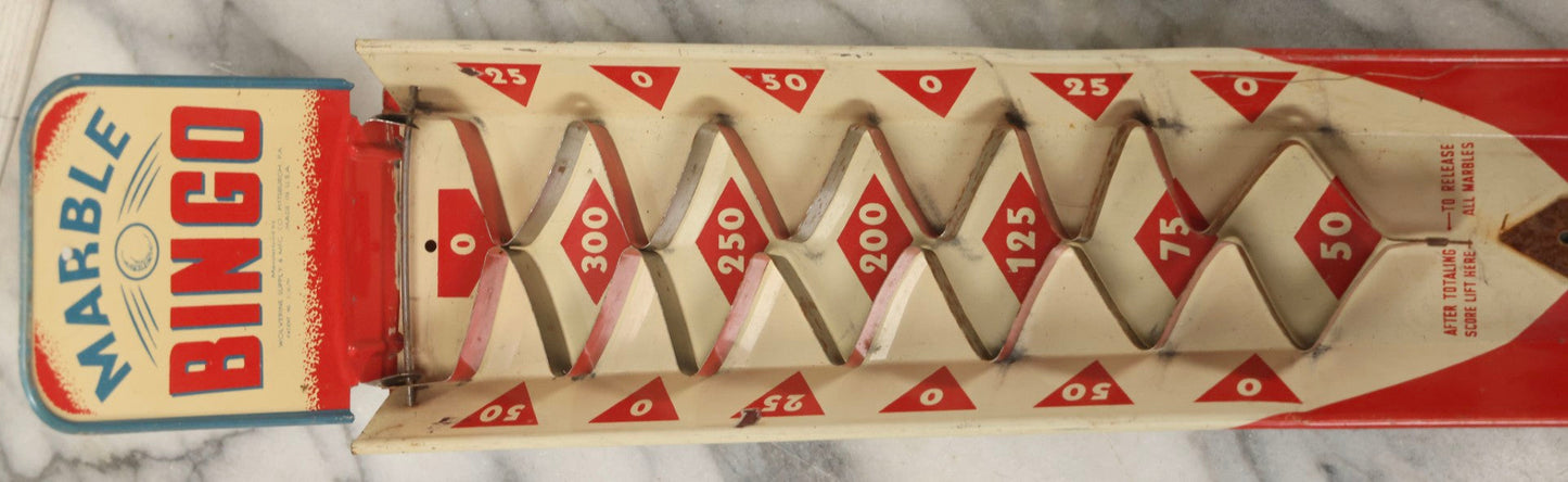 Lot 097 - Vintage Tin Lithograph "Marble Bingo" Toy With Folding Backboard And Spring Launcher, Made By Wolverine Supply Manufacturing Co., Pittsburgh, Pennsylvania, 16-1/2" L