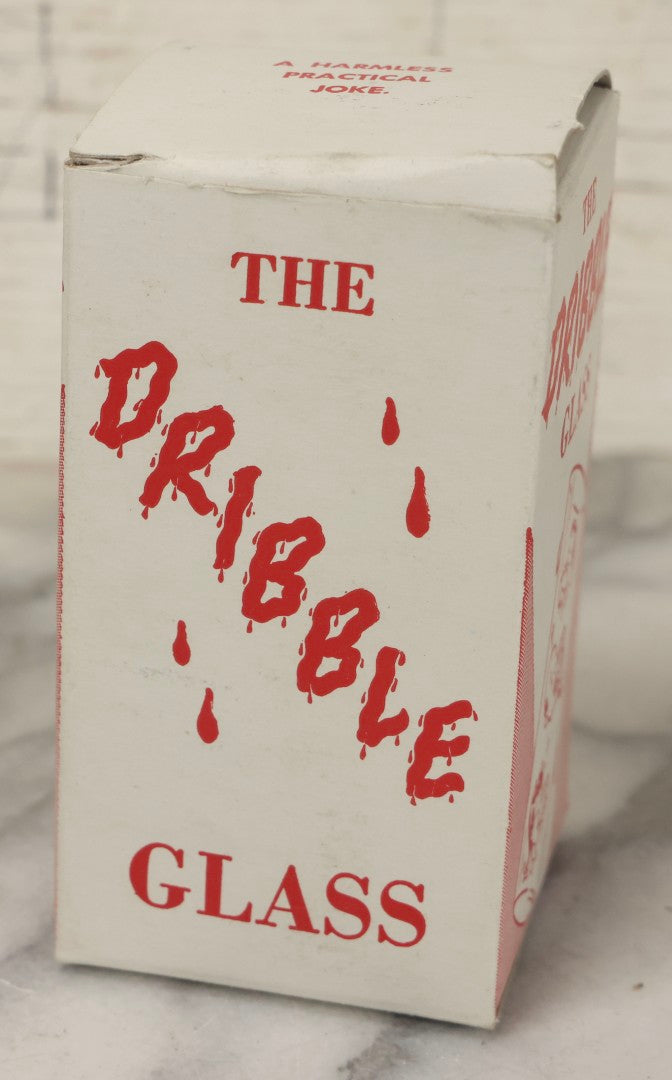 Lot 100 - Grouping Of Three Vintage Novelty Prank Tricks In Original Boxes Including Bending Teaspoon, "The Palpitator," And "The Dribble Glass"