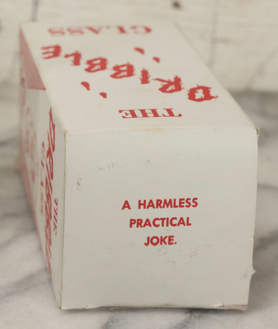 Lot 100 - Grouping Of Three Vintage Novelty Prank Tricks In Original Boxes Including Bending Teaspoon, "The Palpitator," And "The Dribble Glass"