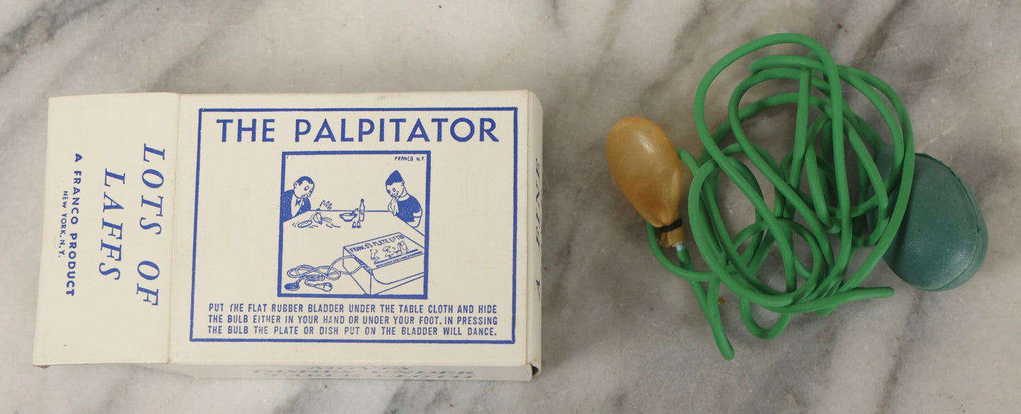 Lot 100 - Grouping Of Three Vintage Novelty Prank Tricks In Original Boxes Including Bending Teaspoon, "The Palpitator," And "The Dribble Glass"