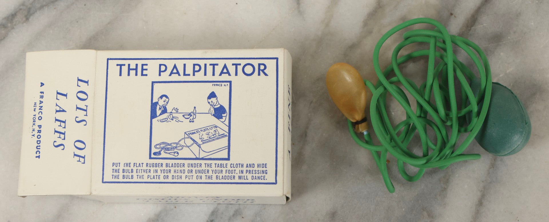 Lot 100 - Grouping Of Three Vintage Novelty Prank Tricks In Original Boxes Including Bending Teaspoon, "The Palpitator," And "The Dribble Glass"