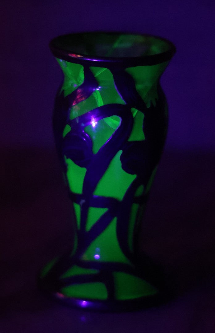 Lot 108 - Antique Green Uranium Glass Beaker-Form Bud Vase With .999 Fine Silver Overlay Floral Lily Design, Marked “Patent G 33.78” And “999 100 Fine” With Illegible Maker's Mark, Note Cracked and Damaged, 4-1/8" H