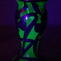 Lot 108 - Antique Green Uranium Glass Beaker-Form Bud Vase With .999 Fine Silver Overlay Floral Lily Design, Marked “Patent G 33.78” And “999 100 Fine” With Illegible Maker's Mark, Note Cracked and Damaged, 4-1/8" H