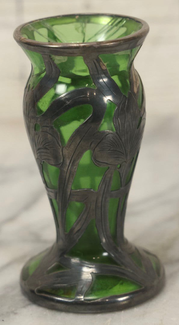 Lot 108 - Antique Green Uranium Glass Beaker-Form Bud Vase With .999 Fine Silver Overlay Floral Lily Design, Marked “Patent G 33.78” And “999 100 Fine” With Illegible Maker's Mark, Note Cracked and Damaged, 4-1/8" H
