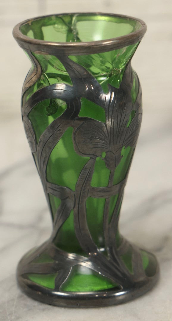 Lot 108 - Antique Green Uranium Glass Beaker-Form Bud Vase With .999 Fine Silver Overlay Floral Lily Design, Marked “Patent G 33.78” And “999 100 Fine” With Illegible Maker's Mark, Note Cracked and Damaged, 4-1/8" H