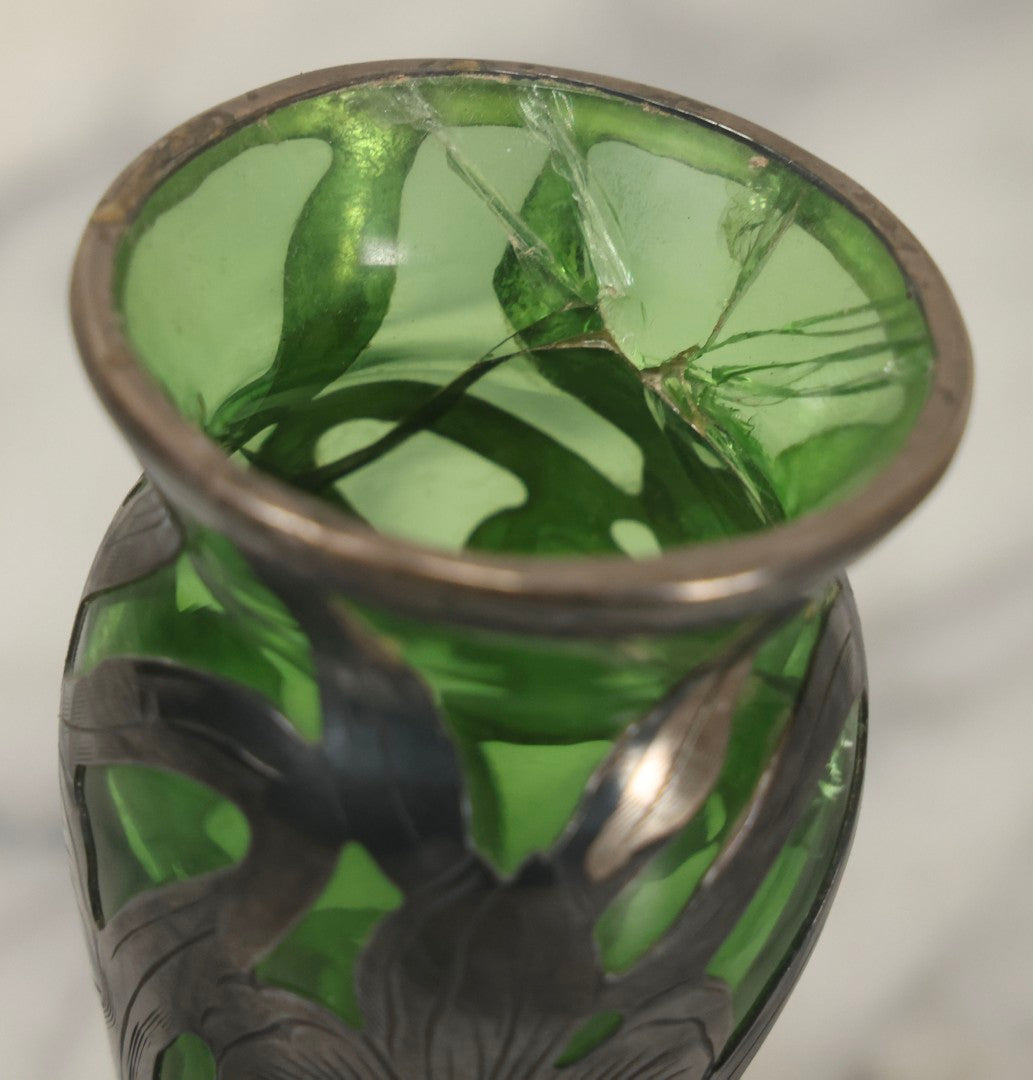 Lot 108 - Antique Green Uranium Glass Beaker-Form Bud Vase With .999 Fine Silver Overlay Floral Lily Design, Marked “Patent G 33.78” And “999 100 Fine” With Illegible Maker's Mark, Note Cracked and Damaged, 4-1/8" H