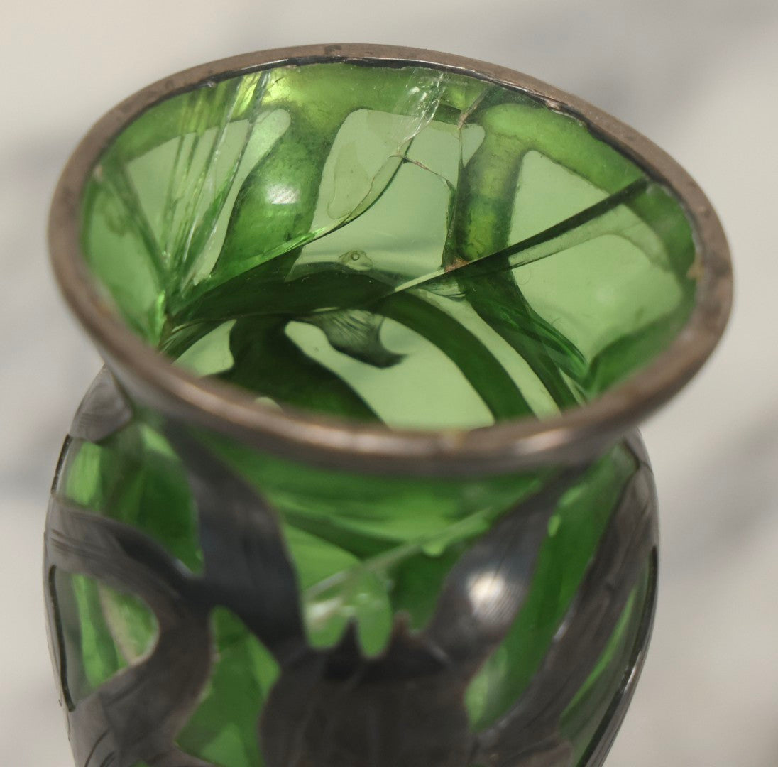 Lot 108 - Antique Green Uranium Glass Beaker-Form Bud Vase With .999 Fine Silver Overlay Floral Lily Design, Marked “Patent G 33.78” And “999 100 Fine” With Illegible Maker's Mark, Note Cracked and Damaged, 4-1/8" H
