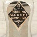 Lot 112 - Vintage W-R Rubbing Alcohol Compound Clear Glass Bottle With Paper Label And Original Cap, 70 Percent Alcohol, Manufactured By William Raymond Co., Philadelphia, Pennsylvania, 8-1/4" H
