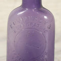 Lot 113 - Antique Embossed Purple Glass Bottle “Humphrey's Homeopathic Veterinary Specifics” With Horse Head Trademark, 3-1/2" H