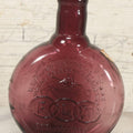 Lot 114 - Vintage Odd Fellows And Rebekah Commemorative Purple Glass Bottle, “New Jersey Eye Bank Visual Research Foundation,” 1973, With All-Seeing-Eye And F.L.T. Three Links, Clevenger Bros. Glass Works, Clayton, New Jersey, 7" H