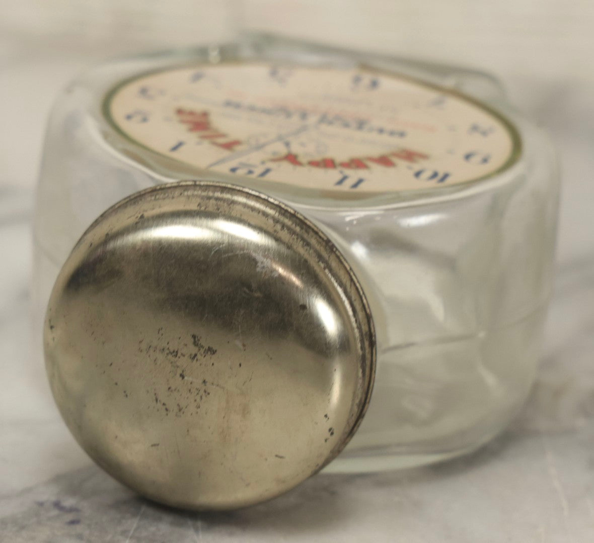 Lot 115 - Vintage "Happy Time" Dutch Lunch Sauce Glass Jar With Lid, Clockface Motif, Nash-Underwood Inc., Chicago, Illinois, 4-5/8" H