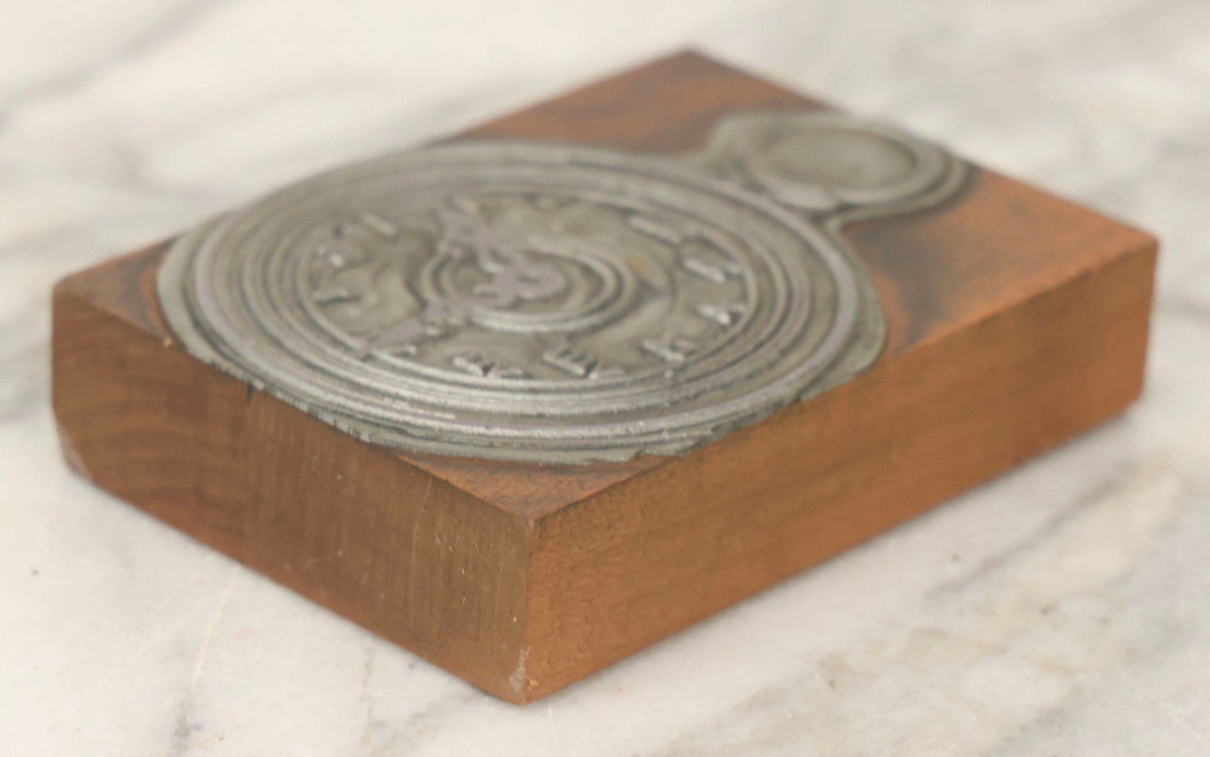 Lot 116 - Antique Printing Block Depicting Pocket Watch With Roman Numerals, With Added Wall Hanger Loop