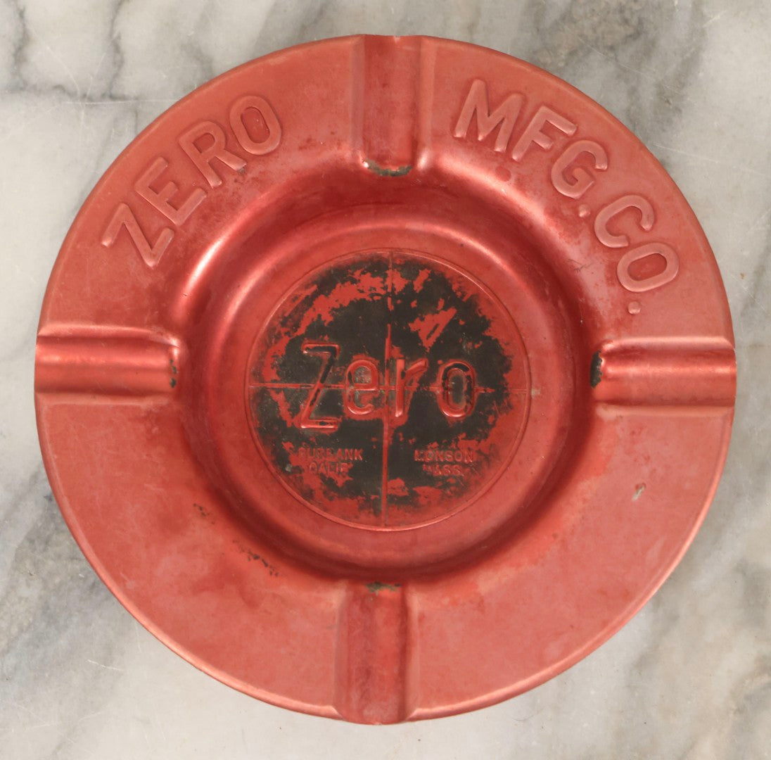 Lot 117 - Vintage Zero Mfg. Co. Pressed Metal Red Ashtray, Burbank, California / Monson, Massachusetts, 5-7/8" Diameter