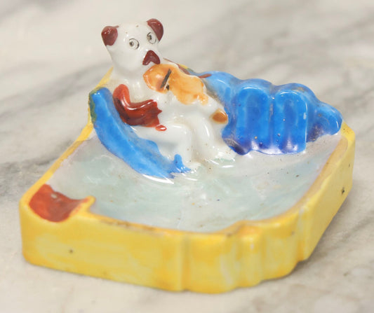 Lot 118 - Vintage Porcelain Novelty Ashtray With Dog Playing Violin On Blue Sofa, Made In Japan, 2-3/4" Wide
