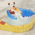 Lot 118 - Vintage Porcelain Novelty Ashtray With Dog Playing Violin On Blue Sofa, Made In Japan, 2-3/4" Wide