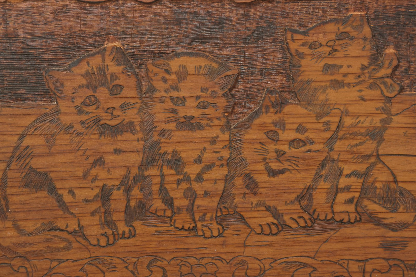 Lot 119 - Antique Flemish Art Pyrography And Carved Plaque Depicting Four Kittens, 15" x 10"
