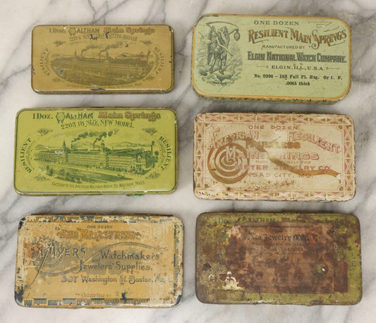 Lot 123 - Grouping Of Six Antique Watchmakers Mainspring Parts Tins Including Waltham, M. Myers, Elgin National, And Meyer Jewelry Co.